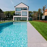 Stylish In With Pool And Garage Apartamento De Haan